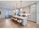 Spacious kitchen with a large island, pendant lighting, and stainless steel appliances at 805 Promenade Dr, Superior, CO 80027