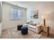 Cozy living room with a comfortable sofa, stylish accents, and a large window offering natural light at 805 Promenade Dr, Superior, CO 80027