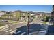 Street view of craftsman homes in a well-maintained neighborhood with mountain views at 805 Promenade Dr, Superior, CO 80027