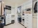 Organized walk-in closet with custom shelving and drawers to maximize storage space at 805 Promenade Dr, Superior, CO 80027