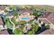 Aerial view of community featuring swimming pool, clubhouse, playground, and picnic area at 4569 Copeland Loop # 203, Highlands Ranch, CO 80126