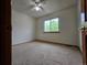 Bright bedroom featuring neutral paint and a ceiling fan at 5571 S Sicily St, Aurora, CO 80015