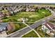 Aerial view of the neighborhood, highlighting the community park, green spaces, and proximity to residential areas at 4320 Snowbird Ave, Broomfield, CO 80020
