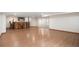 Spacious basement featuring a custom-built wooden bar and ample room for entertaining at 4320 Snowbird Ave, Broomfield, CO 80020