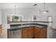 Well-equipped kitchen with a dishwasher and generous counter space, perfect for meal prep at 4320 Snowbird Ave, Broomfield, CO 80020