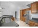 Traditional kitchen featuring wood cabinets, stainless steel appliances, and granite countertops at 4320 Snowbird Ave, Broomfield, CO 80020