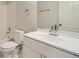 Bright bathroom featuring white vanity, a mirror, and shower-tub combination at 12032 Monaco St, Brighton, CO 80602