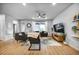 Inviting living room with stylish furniture, ceiling fan, and ample natural light at 5771 Slate River Pl, Brighton, CO 80601