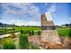 Entrance to Volley Park, showcasing lush green space, walking paths, and community recreation areas at 5771 Slate River Pl, Brighton, CO 80601