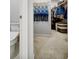 Walk-in closet with carpeted floors and built-in shelves for optimal storage at 5771 Slate River Pl, Brighton, CO 80601