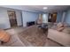 Spacious finished basement featuring carpet, comfortable seating, and a kitchenette at 18908 E Napa Dr, Aurora, CO 80013