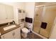 Bathroom with a glass-enclosed shower, modern vanity, and stylish tile flooring creates a fresh and clean space at 18908 E Napa Dr, Aurora, CO 80013