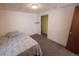 Simple bedroom with carpeting, closet, and natural light at 18908 E Napa Dr, Aurora, CO 80013