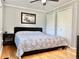 Cozy bedroom with hardwood floors, neutral tones, and double closets at 18908 E Napa Dr, Aurora, CO 80013