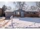 Charming single Gathering home with gray paint, brick accents, front yard, and an attached garage at 18908 E Napa Dr, Aurora, CO 80013