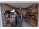 Spacious garage with ample storage space, shelving, and room for parking at 18908 E Napa Dr, Aurora, CO 80013