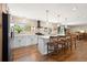 Modern kitchen with stainless steel appliances, a center island, and pendant lighting at 17601 E Eastman Pl, Aurora, CO 80013