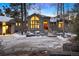 House exterior with walkway and landscaping in winter at 29432 Camelback Ln, Evergreen, CO 80439