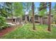 Well maintained home with mature trees, nice landscaping, and an attached three car garage at 29432 Camelback Ln, Evergreen, CO 80439