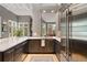 Modern kitchen with stainless steel refrigerator, ample cabinet space, and light countertops at 29432 Camelback Ln, Evergreen, CO 80439