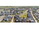 Scenic aerial view of the community featuring houses, parks, and streets, offering a great neighborhood perspective at 9768 E 62Nd Dr, Denver, CO 80238