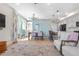 Inviting living area with dining space and kitchen island, ideal for entertaining at 9768 E 62Nd Dr, Denver, CO 80238