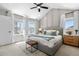 Bright main bedroom with vaulted ceiling, offering a cozy and inviting retreat at 9768 E 62Nd Dr, Denver, CO 80238