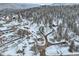 Mountain community featuring homes with beautiful views and snow-covered landscape at 30570 Highway 72, Golden, CO 80403
