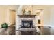 Charming living room fireplace with mantel at 30570 Highway 72, Golden, CO 80403