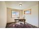 Bright office space with natural light, vintage rug, perfect for a home office or study at 30570 Highway 72, Golden, CO 80403