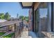 Private balcony with metal railings and brick exterior at 1245 Columbine St # 306, Denver, CO 80206
