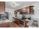 Updated kitchen with stainless steel appliances and contemporary design at 1245 Columbine St # 306, Denver, CO 80206