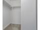 Spacious walk-in closet with ample shelving and neutral carpeting at 1245 Columbine St # 306, Denver, CO 80206
