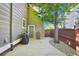 Backyard featuring a patio area ideal for grilling, a side yard, and a gate to the property's perimeter at 16342 Parkside Dr, Parker, CO 80134