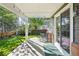 Back patio area featuring a concrete floor, open space and lush trees at 16342 Parkside Dr, Parker, CO 80134