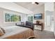 Comfortable main bedroom with a ceiling fan, plush carpet and lots of natural light at 16342 Parkside Dr, Parker, CO 80134