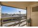 Balcony showing a view of the city and nearby parking at 499 Wright St # 308, Lakewood, CO 80228