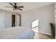 Bedroom showing hardwood floors, ceiling fan, and attached bath at 499 Wright St # 308, Lakewood, CO 80228