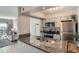 The kitchen showcases granite counters, modern appliances, and an open layout to the living area at 499 Wright St # 308, Lakewood, CO 80228