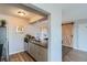 The kitchen features modern appliances, granite countertops, and an open design at 499 Wright St # 308, Lakewood, CO 80228