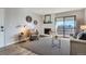 The living room boasts a fireplace, updated flooring, and a calming color palette at 499 Wright St # 308, Lakewood, CO 80228
