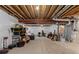Unfinished basement with exposed ceiling and concrete floors, ready for customization at 8550 Cheraw St, Littleton, CO 80125