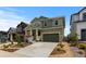Charming two-story home featuring a well-manicured front yard and inviting curb appeal at 8550 Cheraw St, Littleton, CO 80125