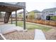 Backyard with stone landscaping, fenced yard and stair access to the deck at 7603 Sabino Ln, Castle Rock, CO 80108