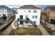 A backyard featuring a two-story deck and patio space, offering a cozy outdoor space at 7603 Sabino Ln, Castle Rock, CO 80108