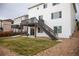 Exterior of home with a spacious backyard, deck, and patio at 7603 Sabino Ln, Castle Rock, CO 80108