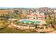 A community pool and recreation center offering a pool, tennis courts, and other amenities for residents at 7603 Sabino Ln, Castle Rock, CO 80108