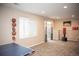 Finished game room featuring sports themed decor and natural lighting at 7603 Sabino Ln, Castle Rock, CO 80108
