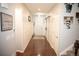 Welcoming foyer with wood floors and board and batten accents at 7603 Sabino Ln, Castle Rock, CO 80108