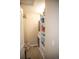 Convenient laundry room with washer, dryer, and shelving for storage at 7603 Sabino Ln, Castle Rock, CO 80108